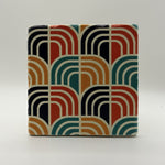 Ethnics pattern number 62 printed on a natural travertine stone coaster