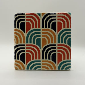 Ethnics pattern number 62 printed on a natural travertine stone coaster