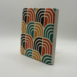 Ethnics pattern number 62 printed on a natural travertine stone coaster