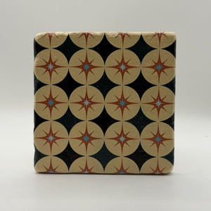 Ethnics pattern number 63 printed on a natural travertine stone coaster