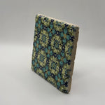 Ethnic pattern number 36 printed on a natural stone coaster
