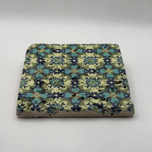 Ethnic pattern number 36 printed on a natural stone coaster
