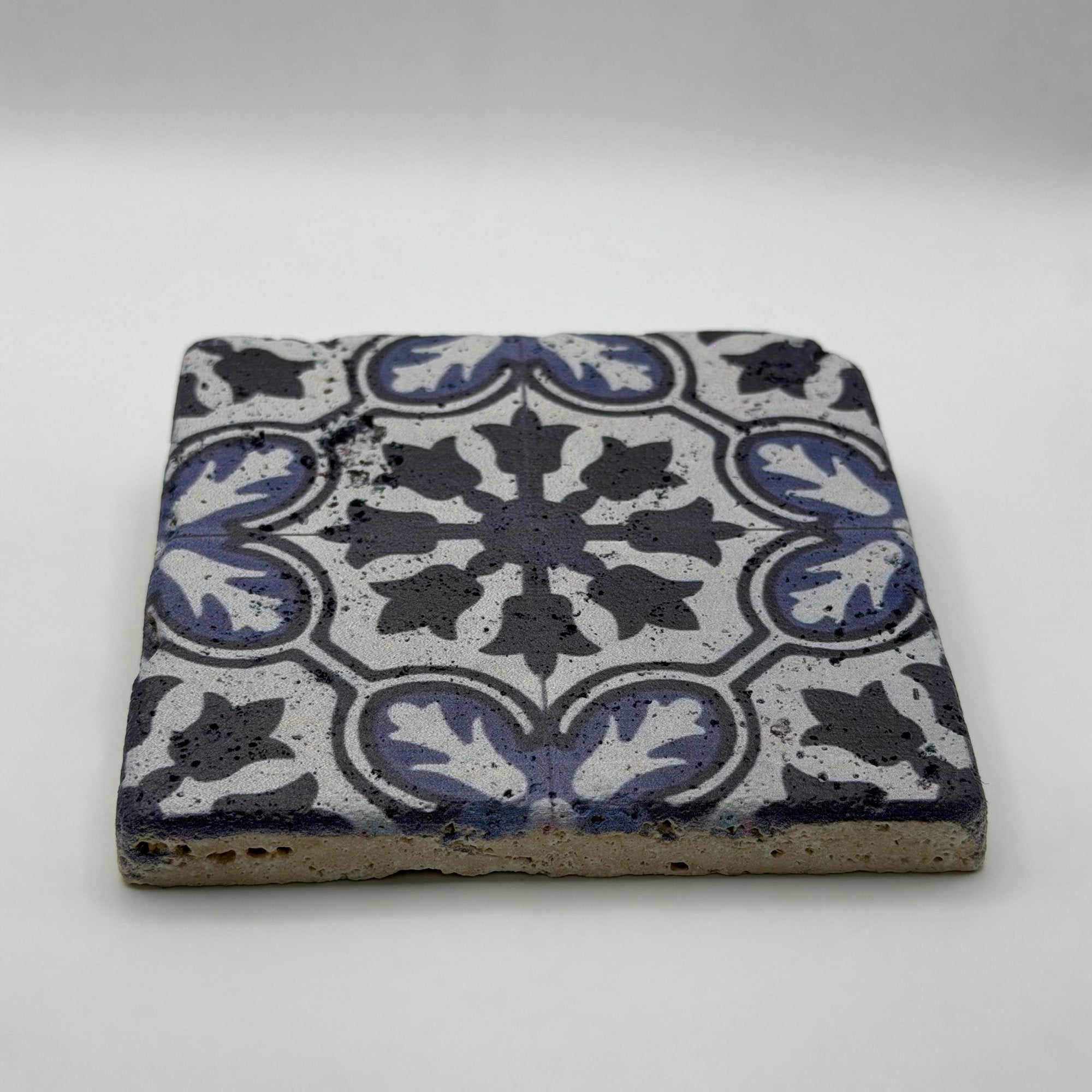 Ethnic pattern number 42 printed on a natural stone coaster