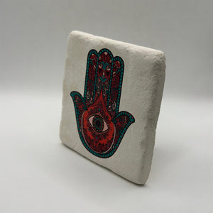 Green Fatima's Hand artwork printed on square travertine stone coaster