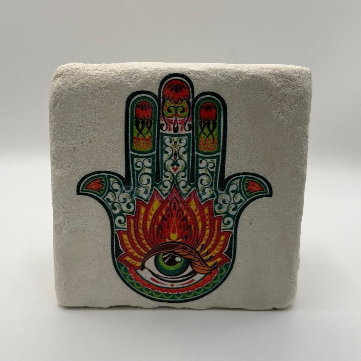 Fatima's Hand design printed on square travertine stone coaster