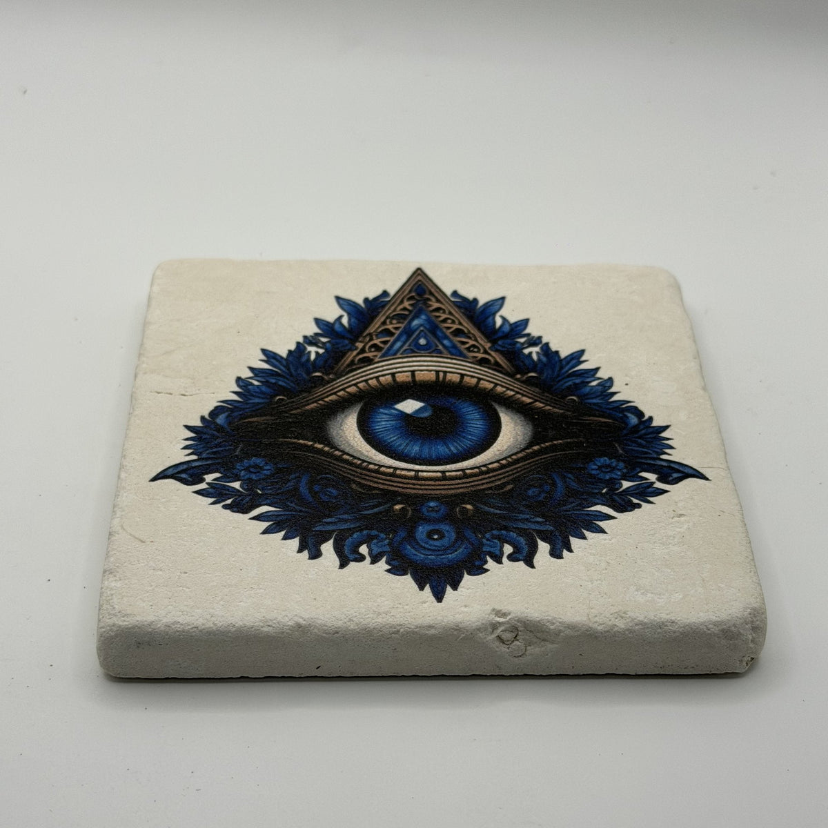 Floral Triangular Blue Eye Natural Travertine Stone Coaster premium artwork
