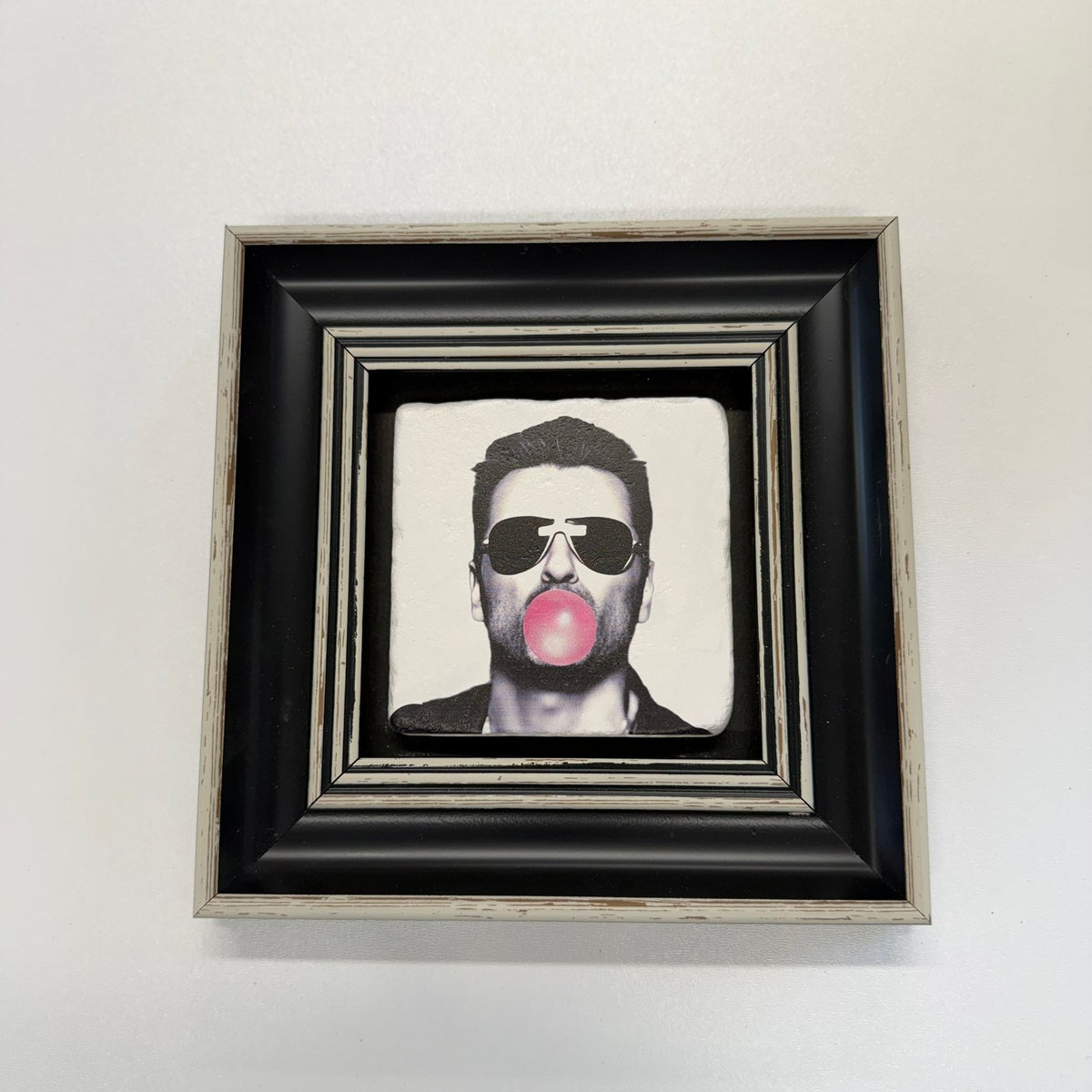 Variant Mapping v4 | george-michael-buble-gum-natural-stone-coaster | with Black Frame | sha256:b36c65f4a5f6