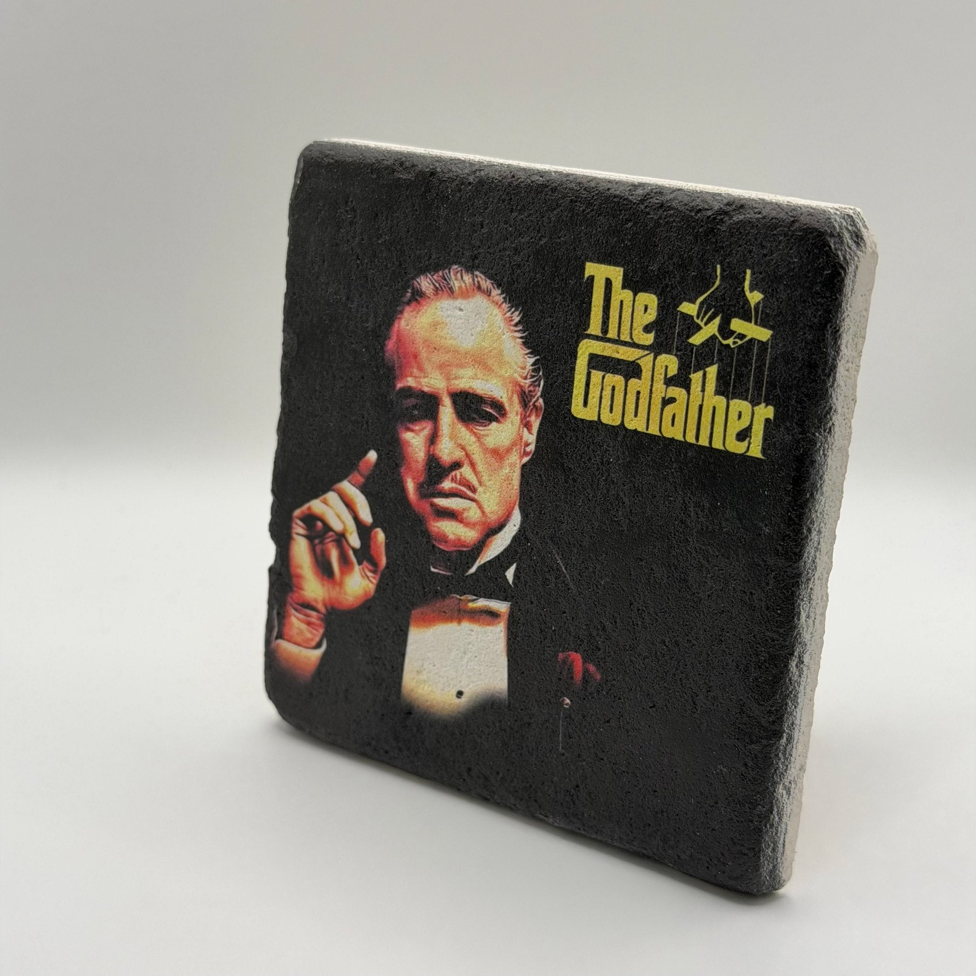 The Godfather artwork printed on square travertine stone coaster