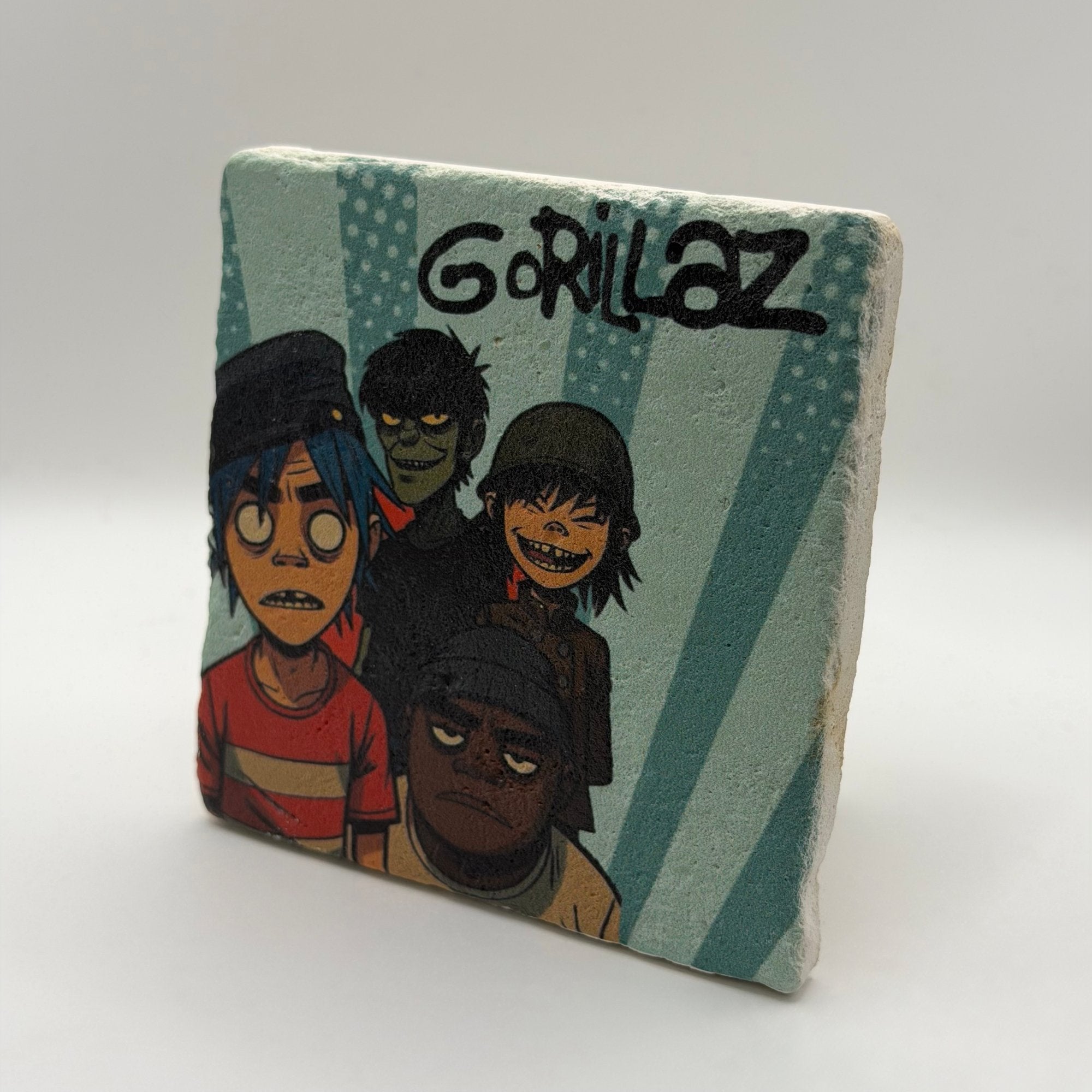 Gorillaz artwork printed on square travertine stone coaster