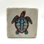A cute green turtle print on a square travertine stone coaster