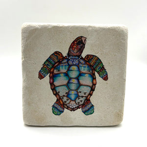A cute green turtle print on a square travertine stone coaster