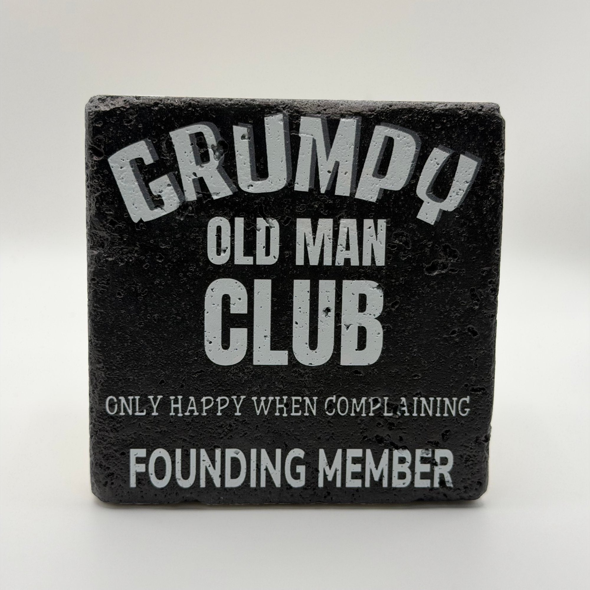 Grumpy Old Man logo printed on square travertine stone coaster