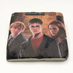 Harry Potter logo and numbers 9 and 3 quarters printed on square travertine stone coaster