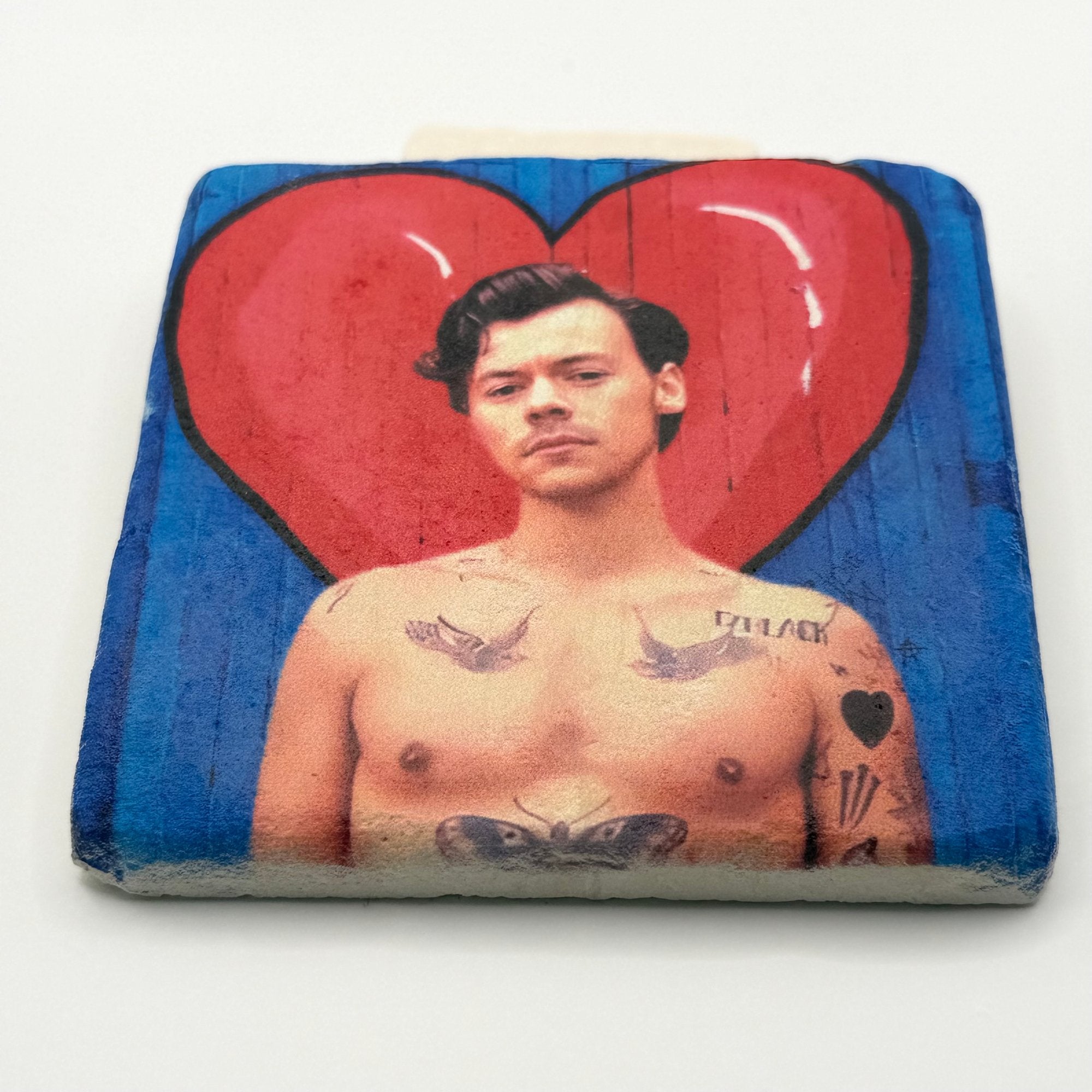 Harry Styles artwork printed on square travertine stone coaster