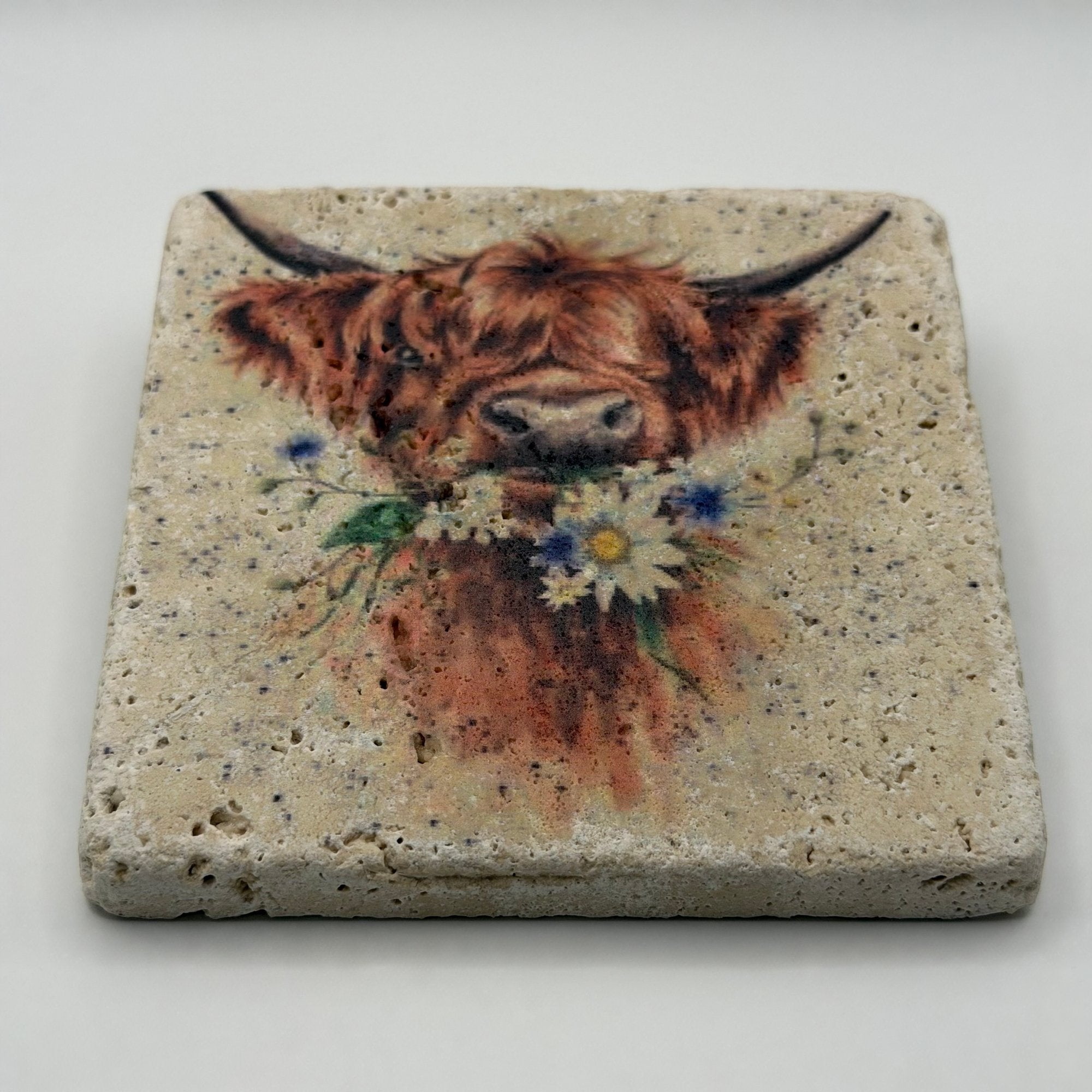 Highland Cow Daisy Coo artwork printed on premium natural travertine stone coaster