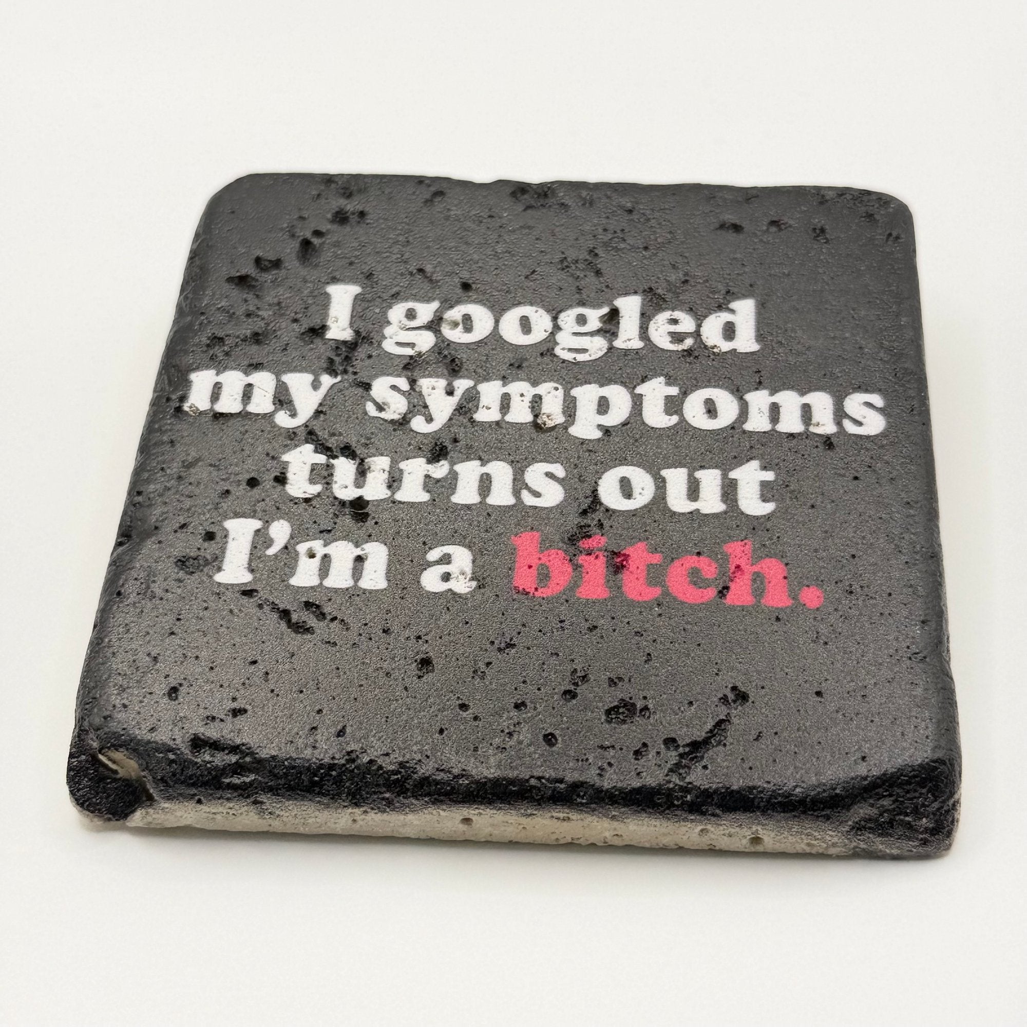 Funny slogan printed on square travertine stone coaster: 'I Googled my symptoms, turns out I'm a bitch'