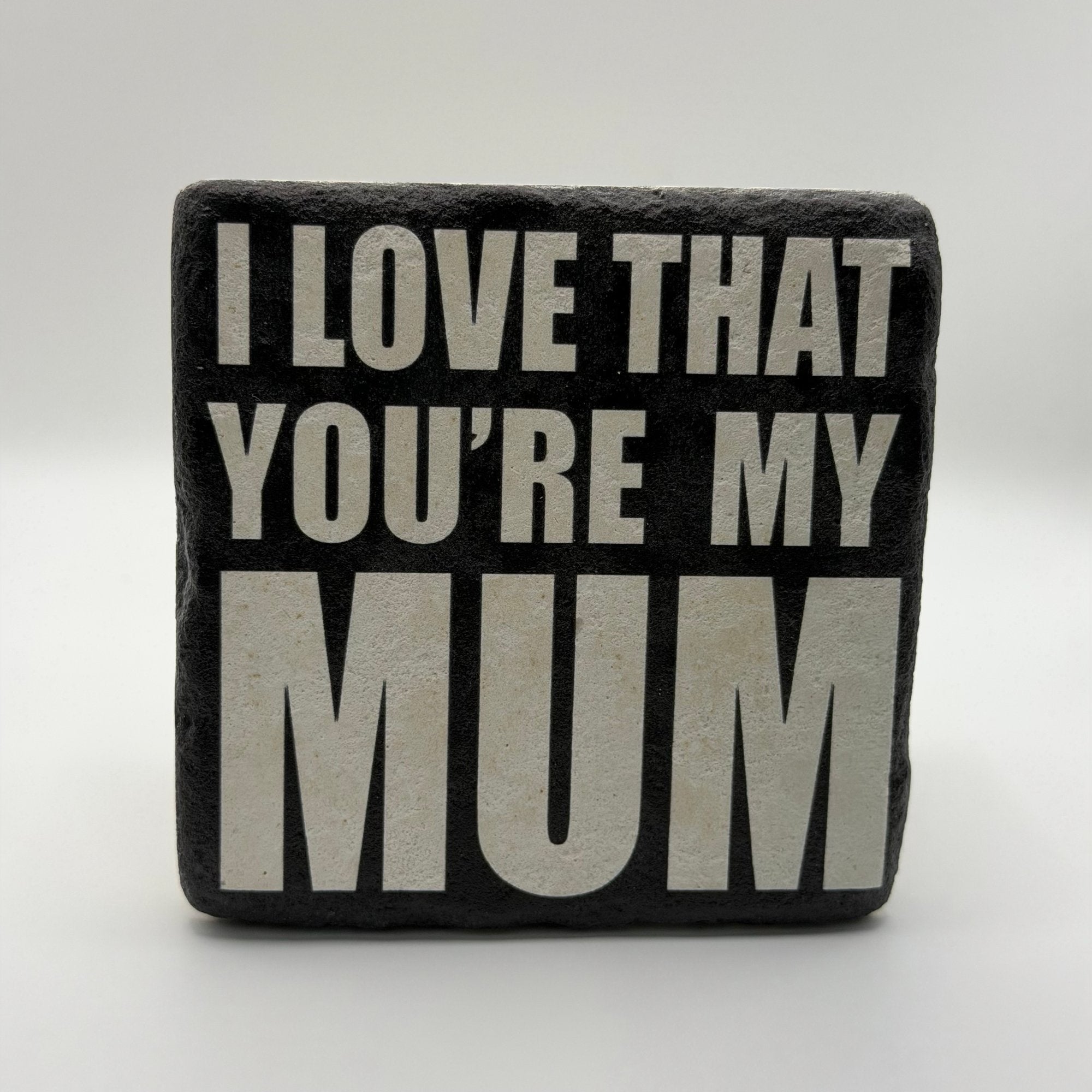 Heartfelt 'I love that you're my mum' quote printed on square natural travertine stone coaster