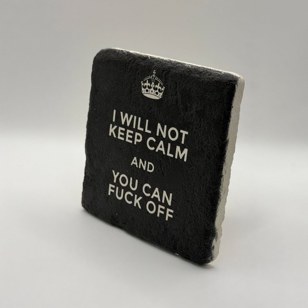 Funny slogan 'I Will Not Keep Calm And You Can Fuck Off' printed on square travertine stone coaster