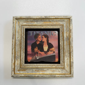 Variant Mapping v4 | james-cameron-titanic-natural-stone-coaster | with Gold Frame | sha256:5845662e9fc5
