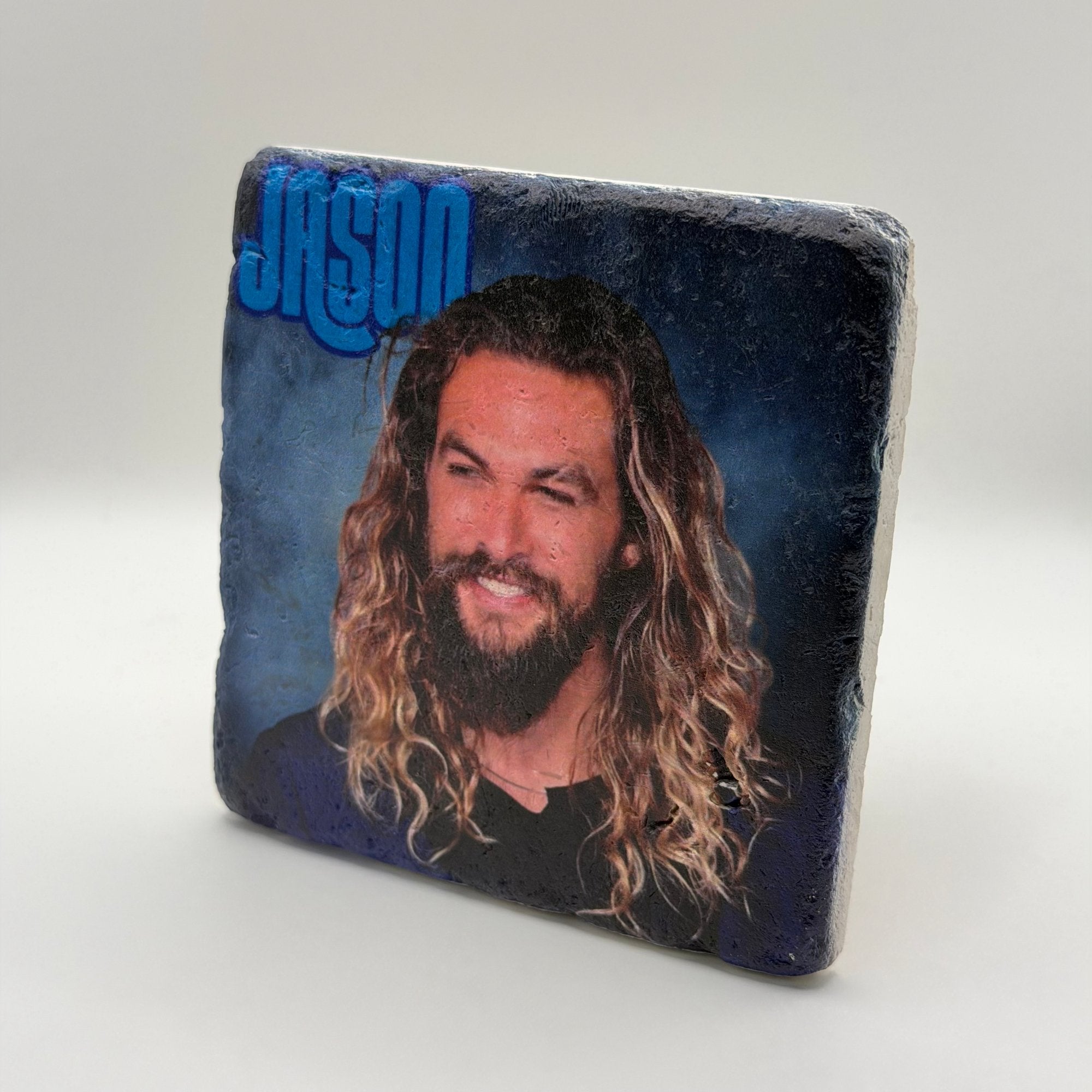 Jason Momoa portrait printed on square travertine stone coaster