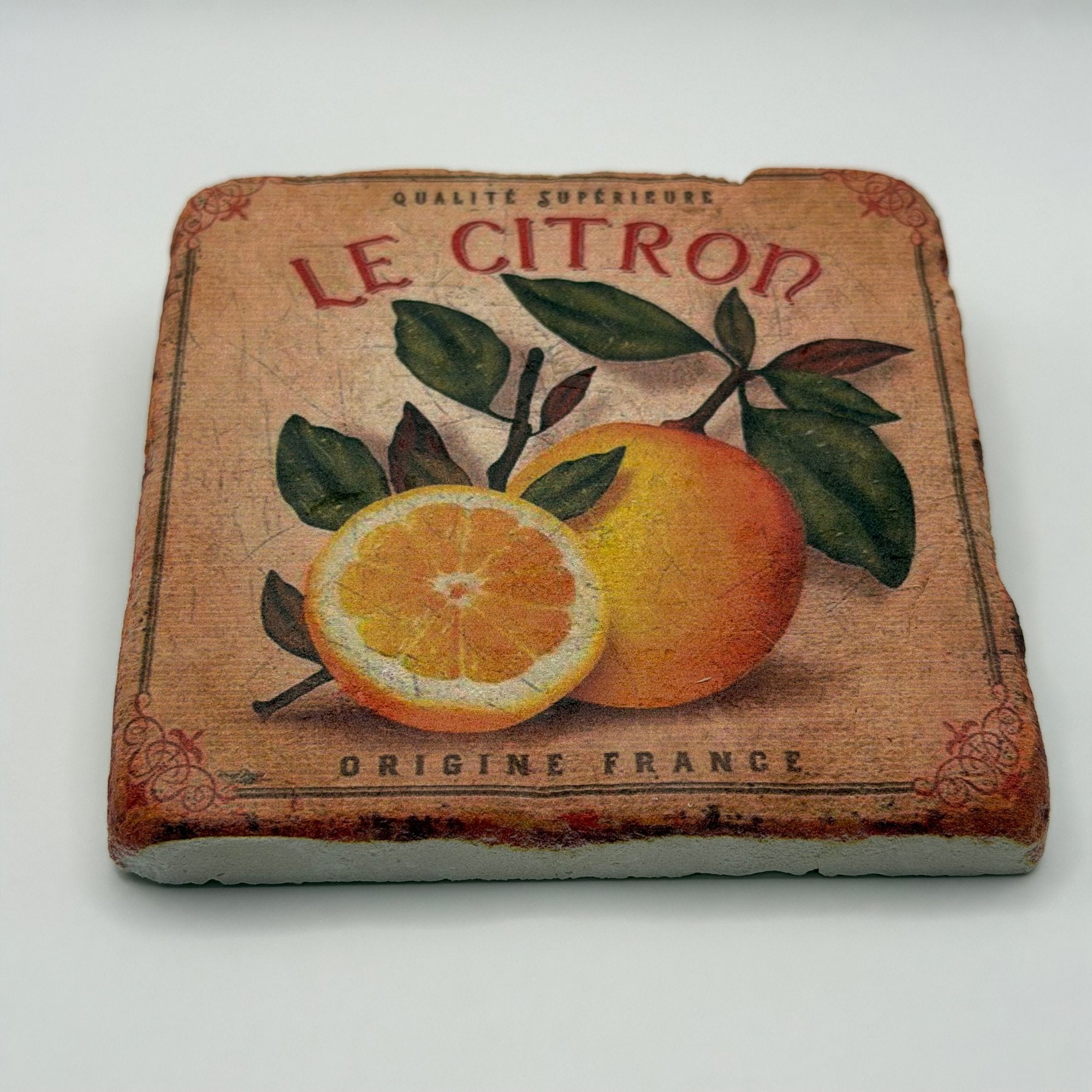 Le Citron artwork printed on square travertine stone coaster