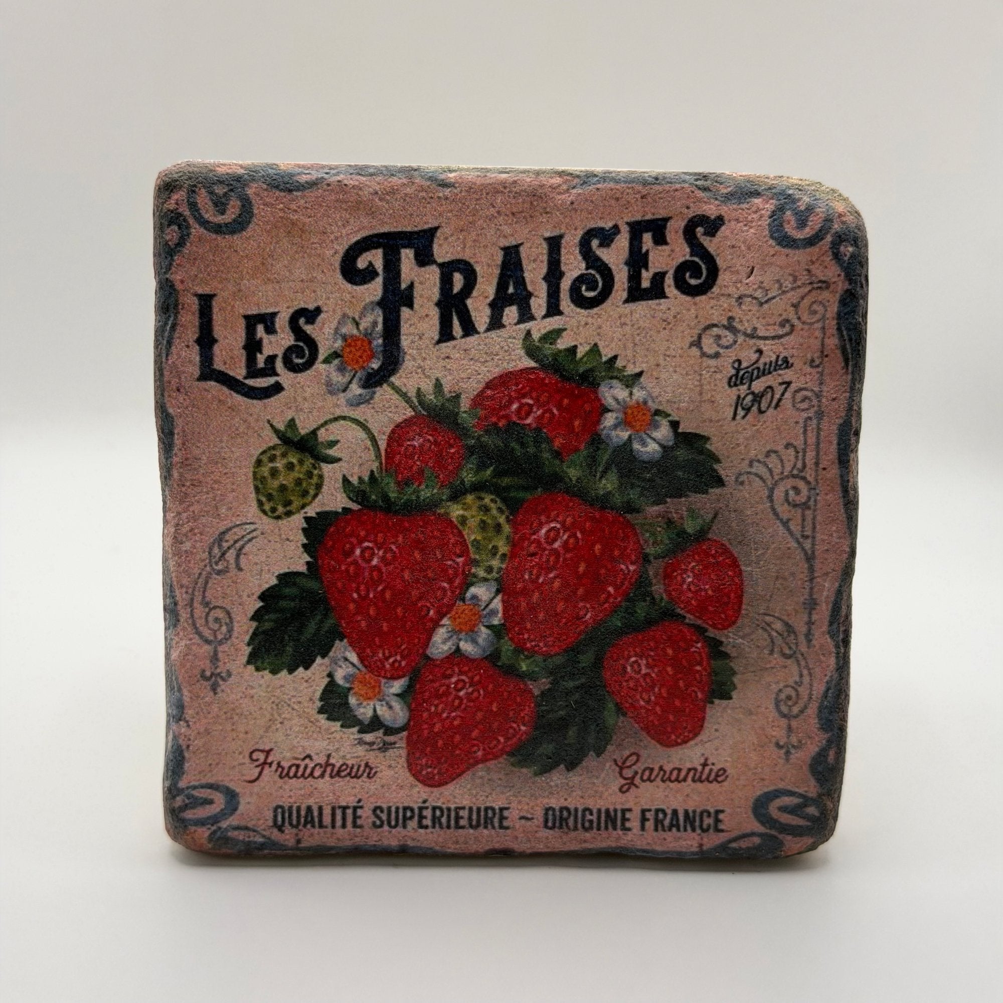 Vintage Les Fraises artwork printed on square travertine stone coaster