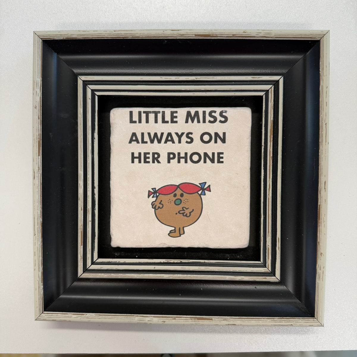 Variant Mapping v4 | little-miss-always-on-her-phone-natural-stone-coaster | with Black Frame | sha256:bd3fc3bcad1a