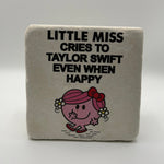 Little Miss character illustration crying about Taylor Swift printed on square travertine stone coaster