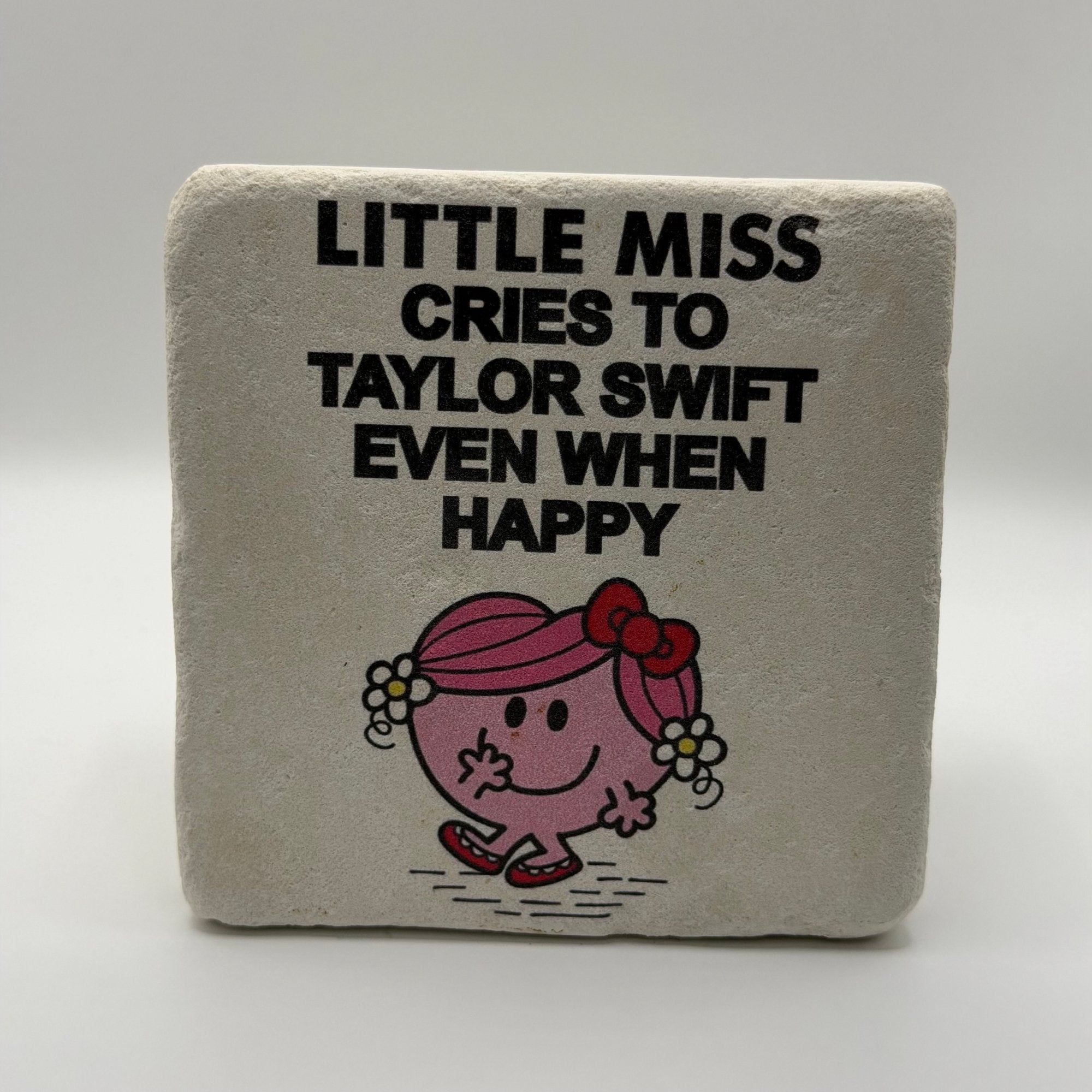 Little Miss character illustration crying about Taylor Swift printed on square travertine stone coaster