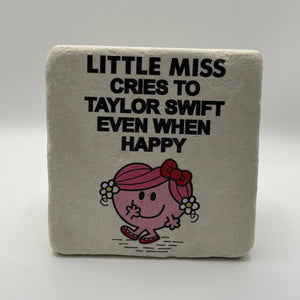 Little Miss character illustration crying about Taylor Swift printed on square travertine stone coaster