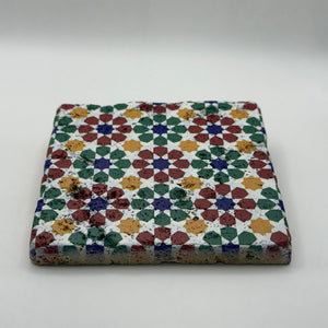 Moroccan tribal pattern printed on square travertine stone coaster