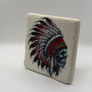 Native American artwork featuring a skull design printed on square travertine stone coaster