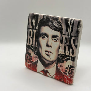 Thomas Shelby artwork printed on square travertine stone coaster