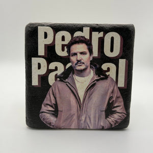 Pedro Pascal portrait printed on square travertine stone coaster