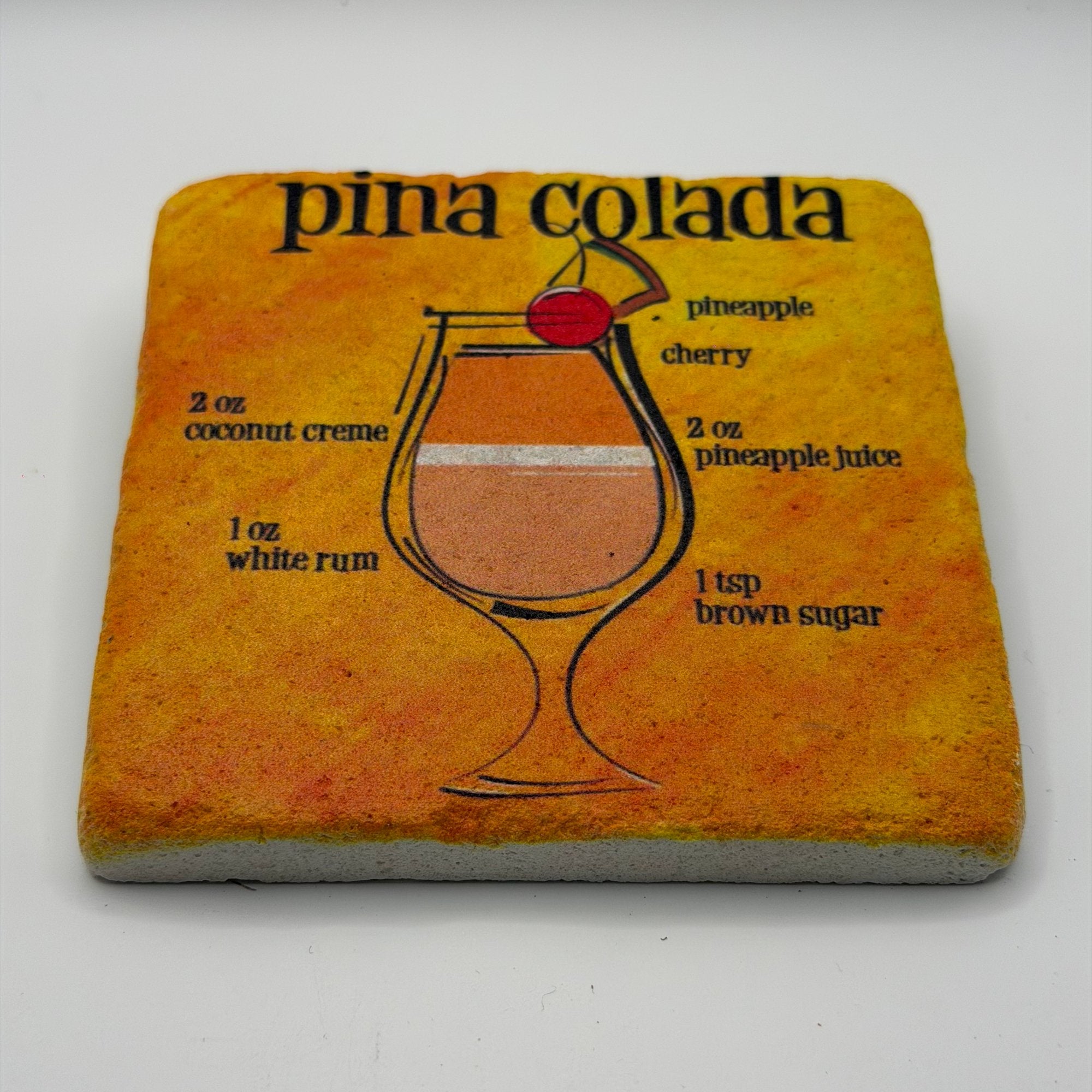 Tropical pineapple artwork printed on square travertine stone coaster