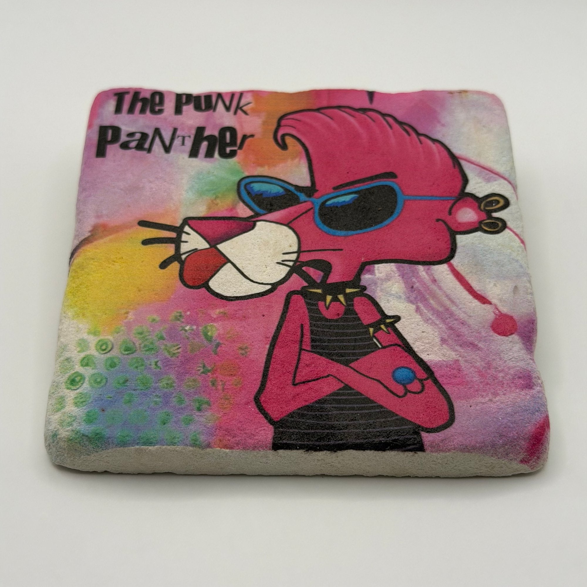 Pink Panther artwork printed on square travertine stone coaster