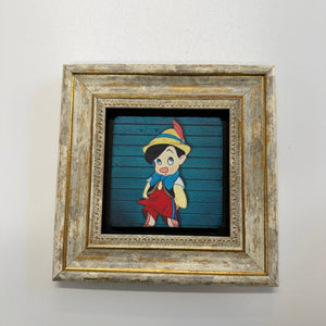 Variant Mapping v4 | pinocchio-natural-stone-coaster | with Gold Frame | sha256:4ea7e099ce05