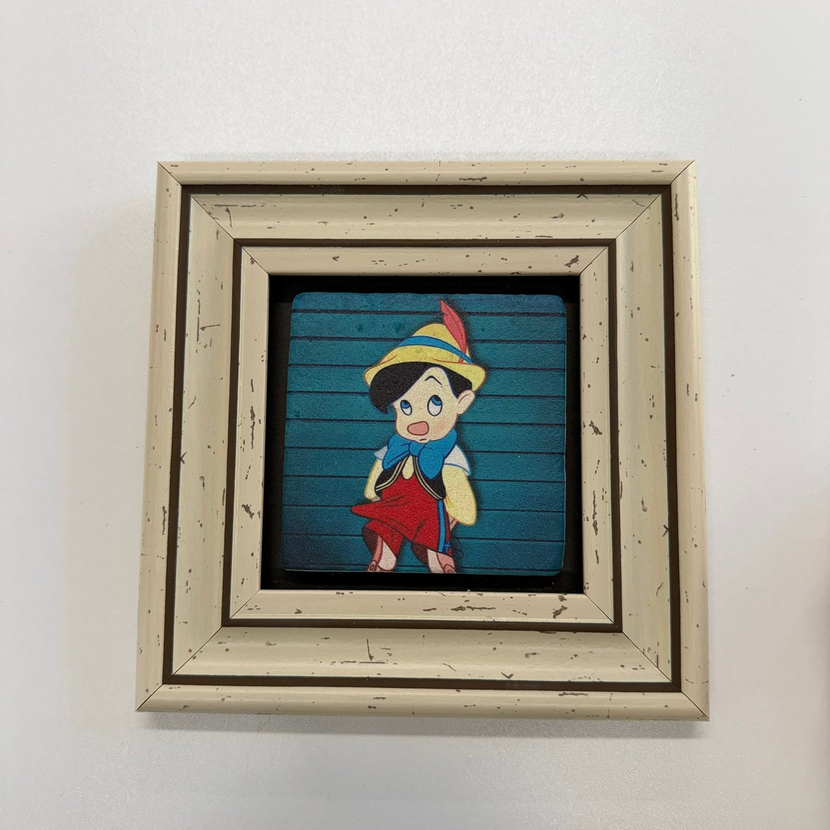 Variant Mapping v4 | pinocchio-natural-stone-coaster | with White Frame | sha256:ff7e47617612