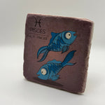 Pisces zodiac symbol printed on square travertine stone coaster