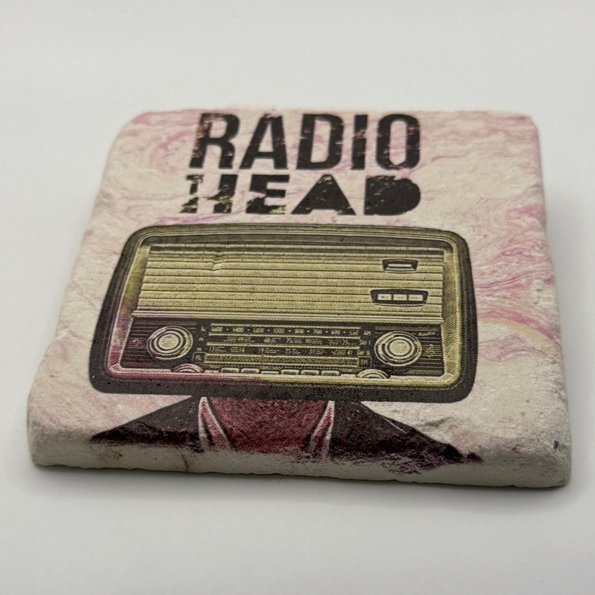 Radiohead artwork printed on square travertine stone coaster