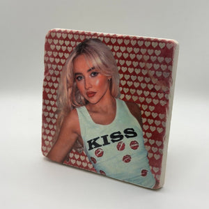 Sabrina Carpenter kiss artwork printed on square travertine stone coaster