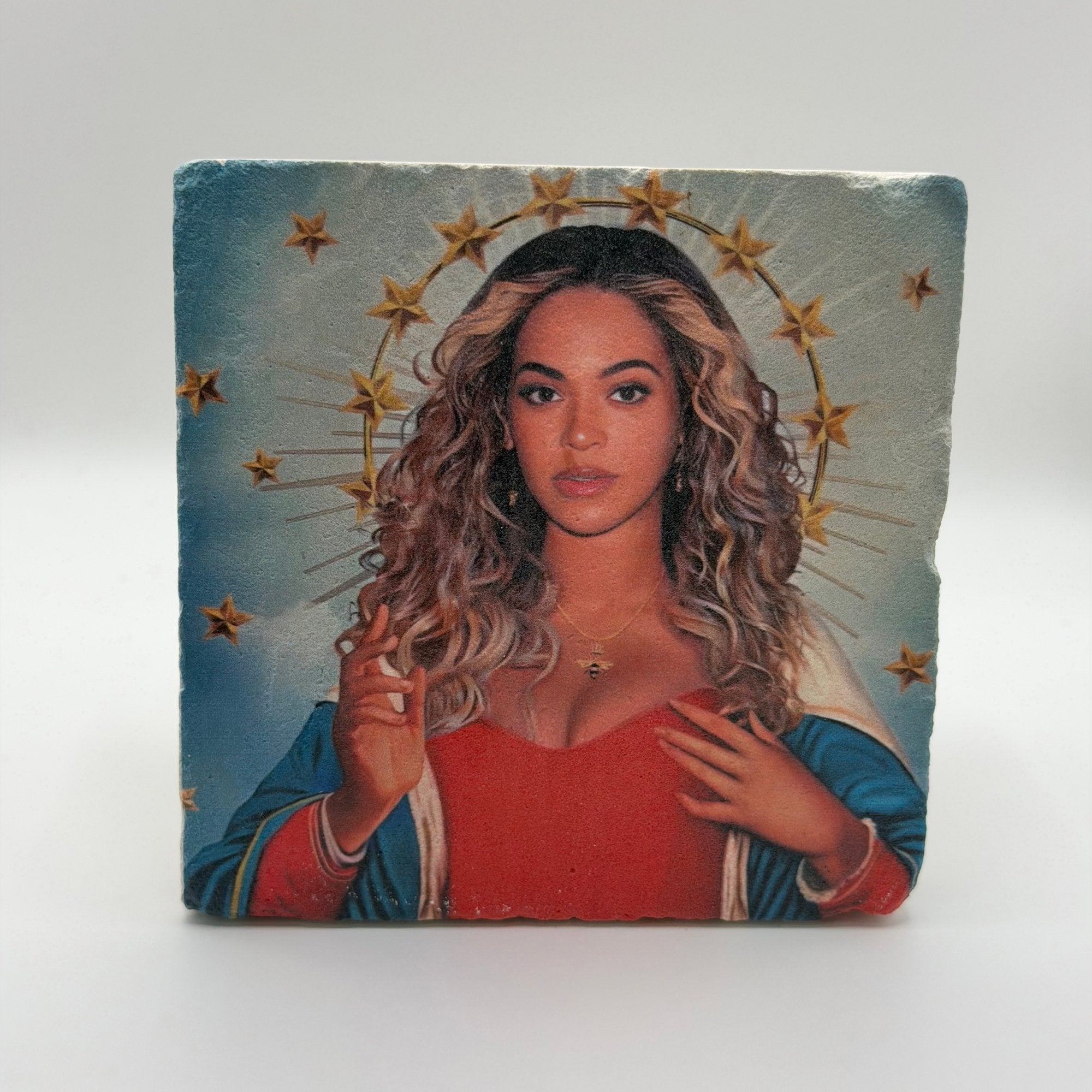 Saint Beyoncé artwork printed on square natural travertine stone coaster