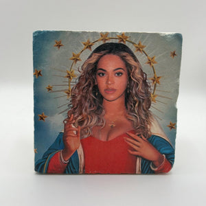 Saint Beyoncé artwork printed on square natural travertine stone coaster