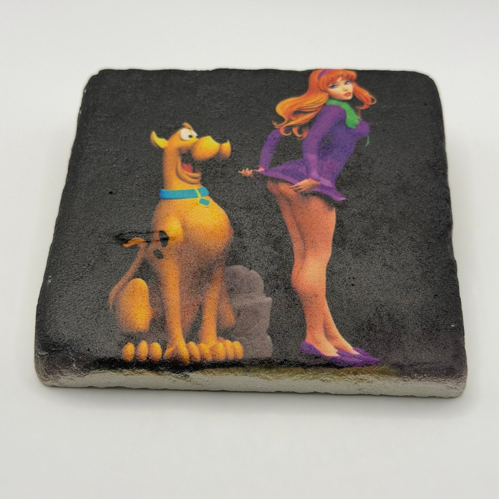 Scooby-Doo and Daphne Blake artwork printed on square travertine stone coaster