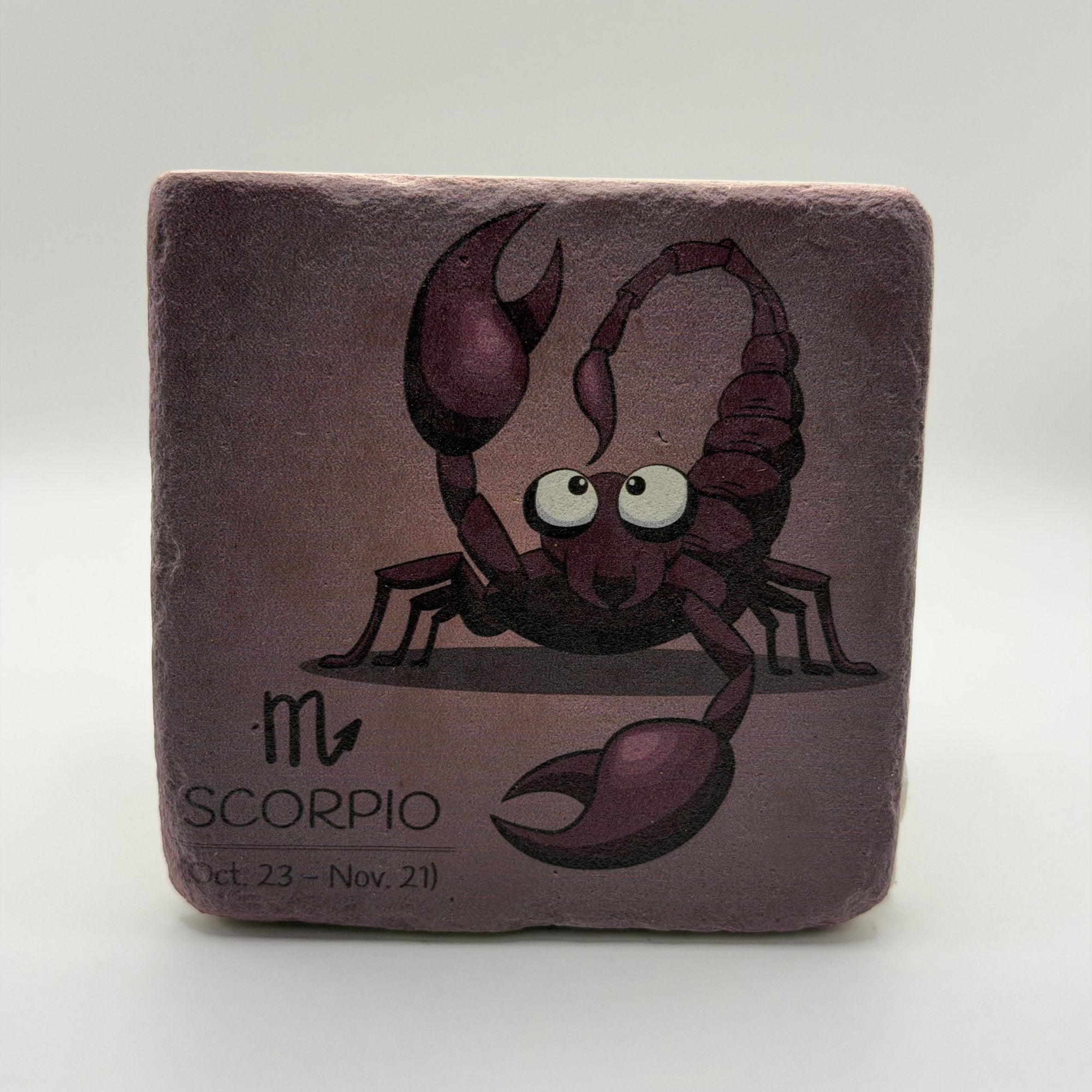 Scorpio astrological symbol printed on square travertine stone coaster