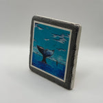 Illustration of a sea farer printed on square travertine stone coaster