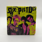 Sex Pistols artwork printed on square travertine stone coaster
