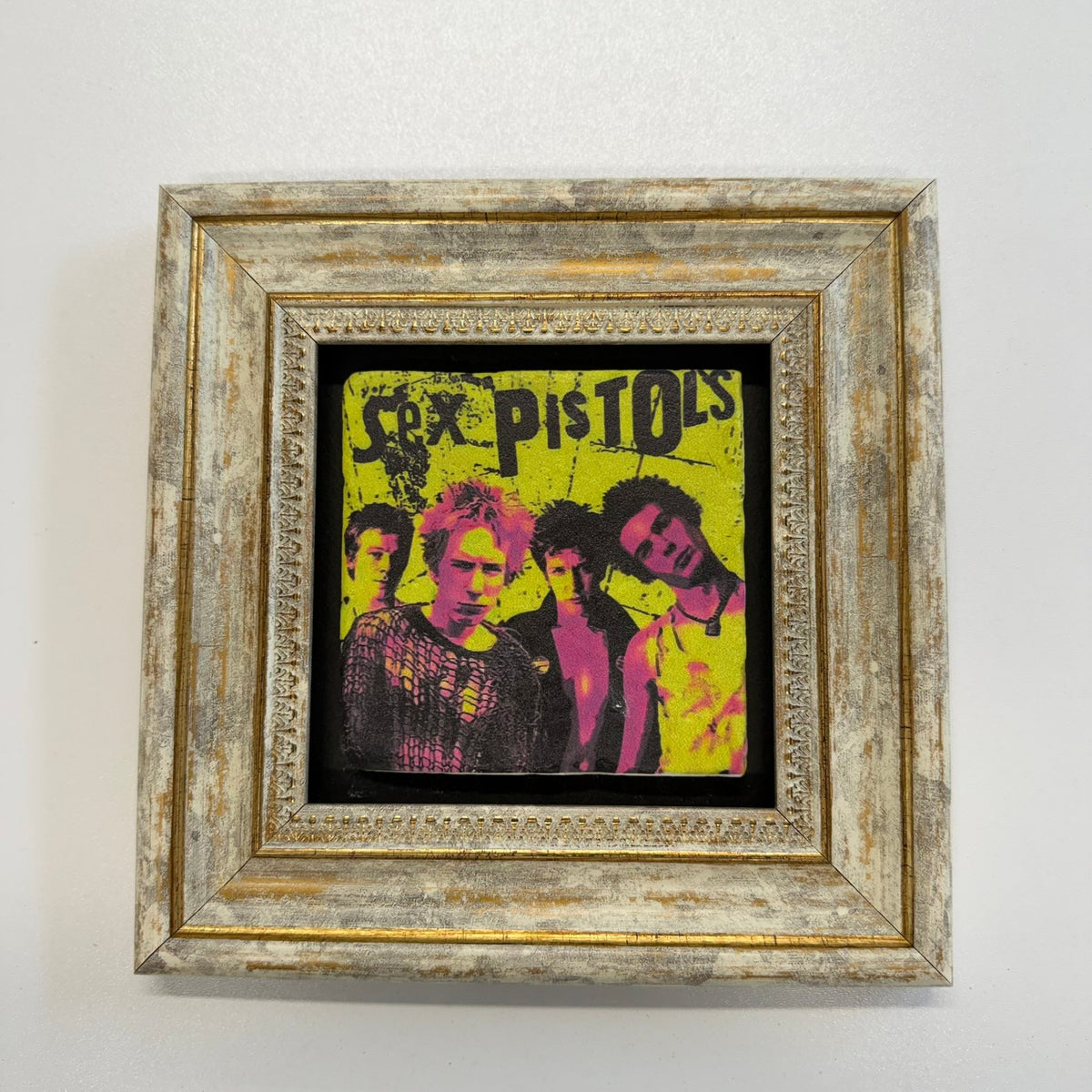 Variant Mapping v4 | sex-pistols-natural-stone-coaster | with Gold Frame | sha256:a83b41fe4901