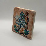 Starfish and seahorse artwork printed on square travertine stone coaster