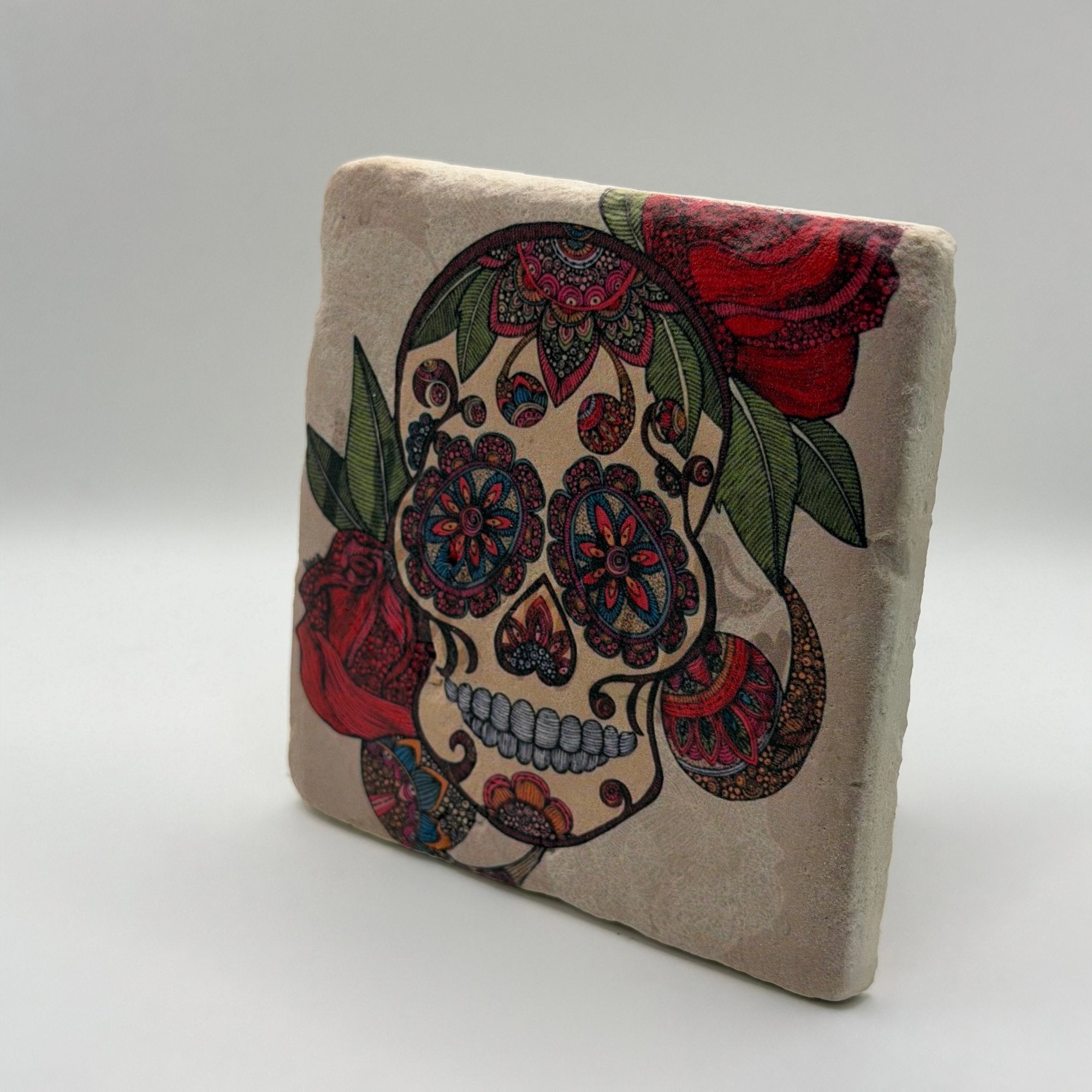 Sugar skull artwork printed on square travertine stone coaster